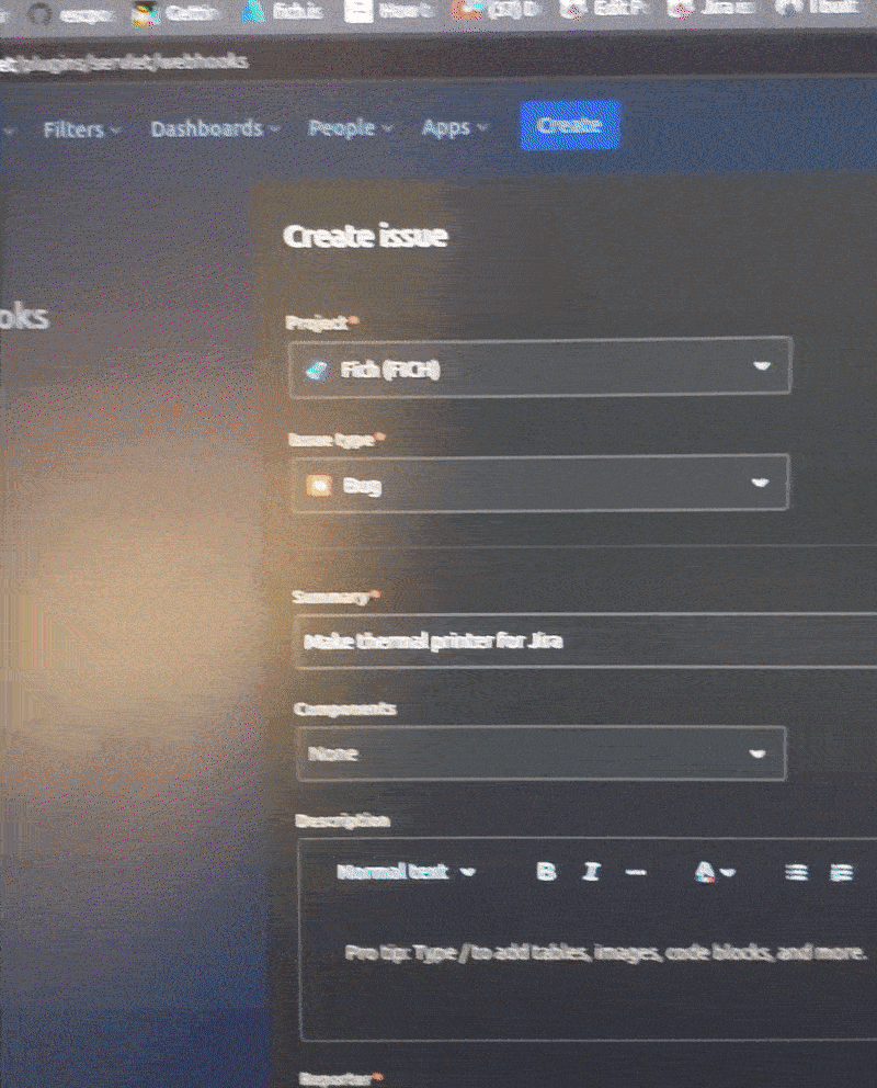 Animated GIF showing thermal printer printing a Jira issue